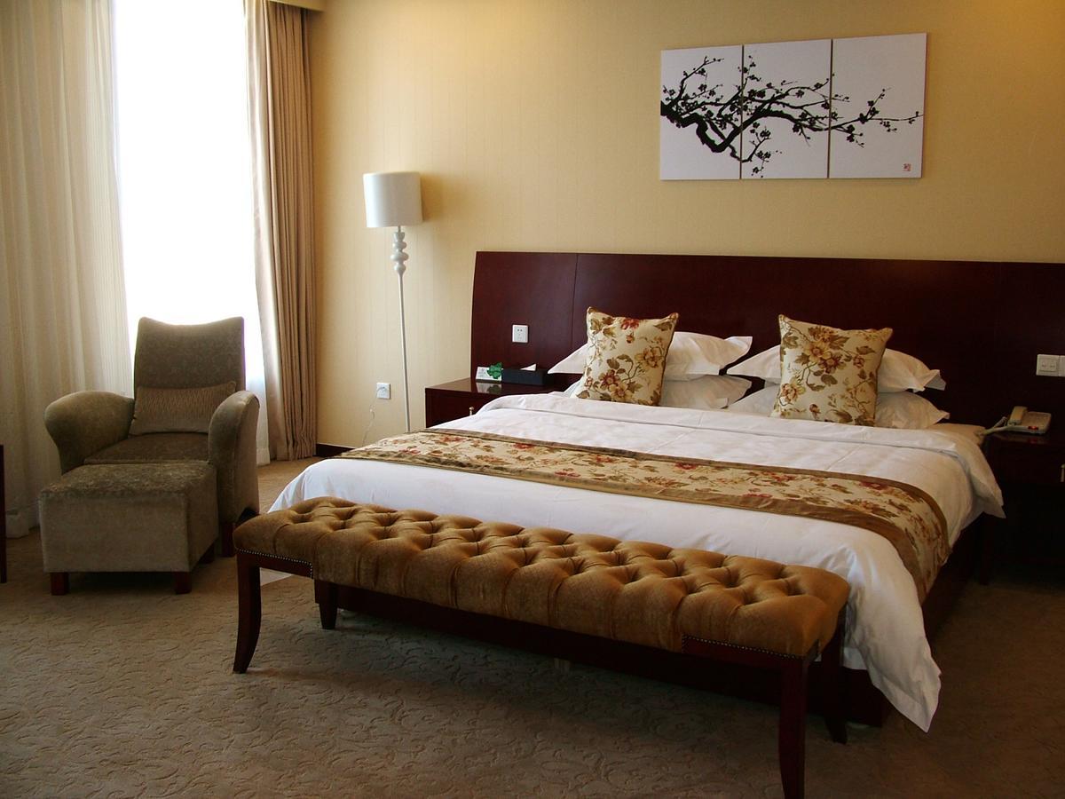 Fuxing Oriental Boutique Hotel Chifeng Værelse billede