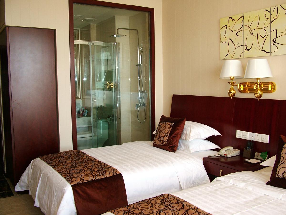 Fuxing Oriental Boutique Hotel Chifeng Værelse billede