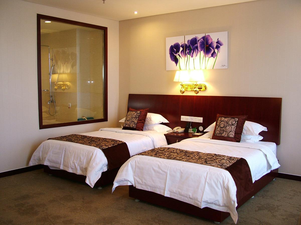 Fuxing Oriental Boutique Hotel Chifeng Værelse billede