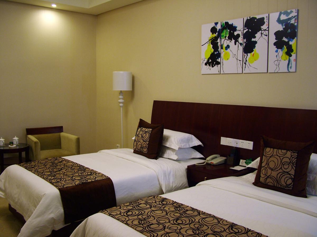 Fuxing Oriental Boutique Hotel Chifeng Værelse billede