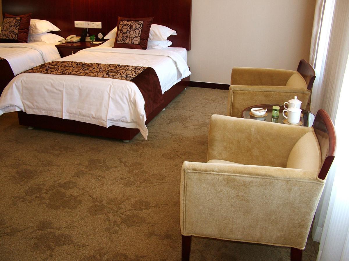 Fuxing Oriental Boutique Hotel Chifeng Værelse billede